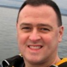Tj kayaking headshot.large